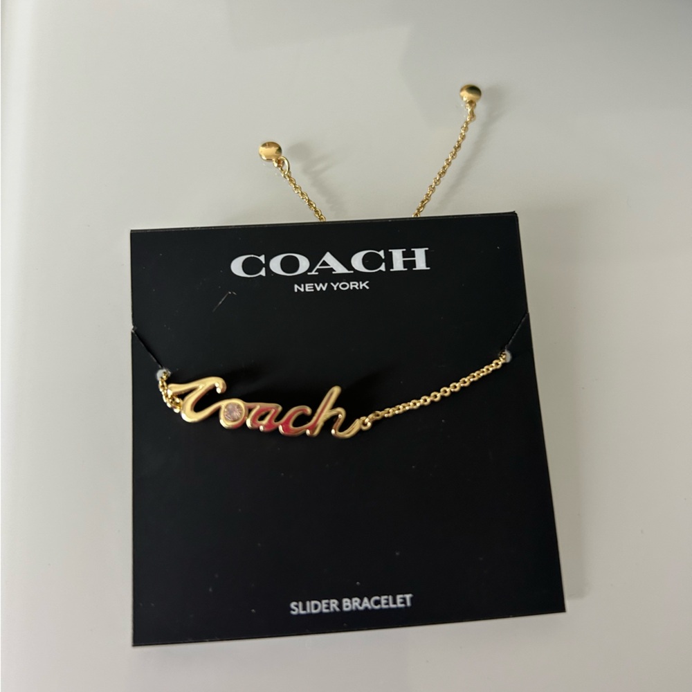 Coach Gold cursive logo slider Bracelet